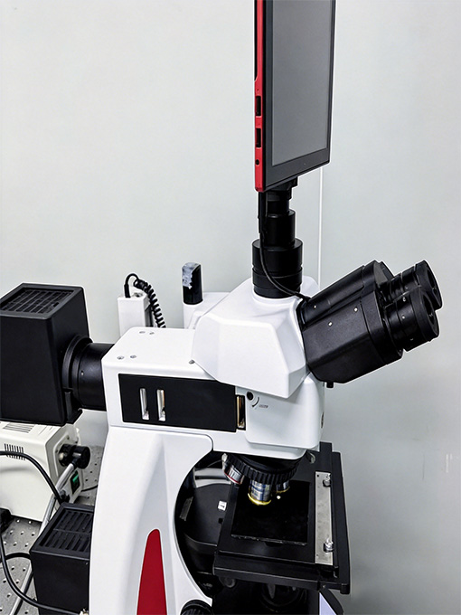 Microscope for optical coating defect inspection and analysis